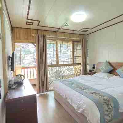 千戶苗寨壹田拾光民宿 Rooms