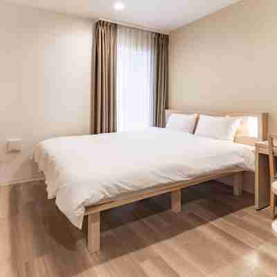 住一HOTEL関空店 Rooms