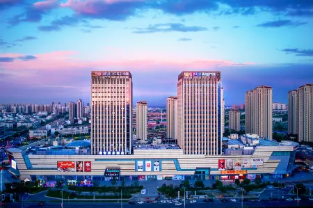 Nanshe Business Hotel (Tianjin New National Convention and Exhibition Center Jinnan Wuyue Plaza) Отели рядом с достопримечательностью «Tianjin Occupation Skill Public Training Center Gymnasium»