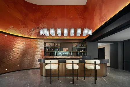 Yibin Qianyi Hotel Отели рядом с достопримечательностью «Li Zhuang Lv You»