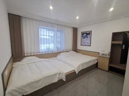 Erlanghe Xueyun Holiday Hotel Отели рядом с достопримечательностью «Erlang River»