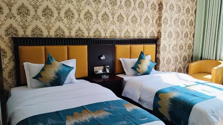 Happiness Sunsea Hotel Отели рядом с достопримечательностью «Отдел Управления охраны Уезда Чуанбэ, национальный природный заповедник Юньнань Циншань»