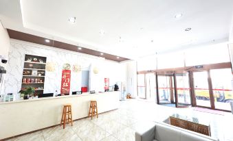 Aoliyang Business Hotel (Zhuanghe Jinma Plaza)
