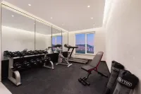 Dalian Songjing Hotel (Dalian Railway Station Renmin Square Branch) - salle de sport