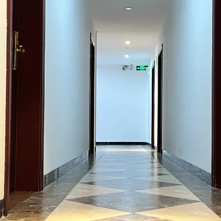 7 xing Ge Business Hotel