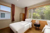 Floral Hotel· Read Mountains & Sea (Gumoling Health Theme Park Branch) - balcony