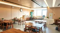 克拉瑪依都市926商務飯店（新疆油田勘探開發研究院店） - 機場接送