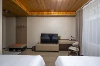 Huaxi·Longmen Manor Hotel (Longmen Grottoes Northwest Service Area Longmen High-Speed Rail Station) - Park Yeri