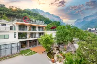 Qian Na Mei Su Hotel (Xinxiang Baligou) 곽량터널 주변 호텔