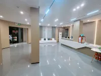 Four Seasons Smart Hotel (Zhoukou Passenger Transport Center Station)