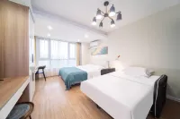Justin Boutique Hotel Apartment (YangZhou Shouxihu Scenic Area Dongguan Street Branch) - Condos