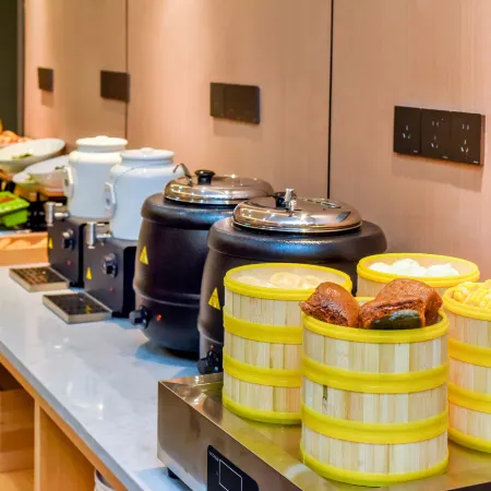7 Days Premium Hotel (Chongqing Kaizhou District Government Square) Отели рядом с достопримечательностью «Кэчжоу Большой Рынок»