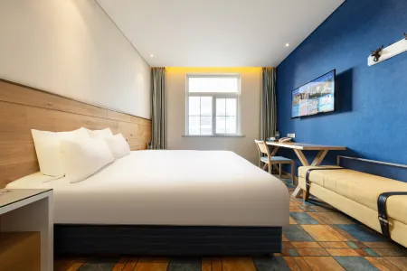 Yantai  Overseas Chinese boutique Hotel Отели рядом с достопримечательностью «Yantai Natural Museum»