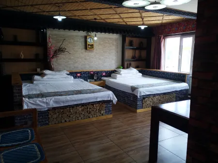 Anmenjia Homestay Отели рядом с достопримечательностью «Wuying Highway Passenger Transport Terminal»