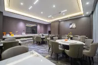 Xishuangbanna Tillman Hotel (Gasa International Airport) - servizio colazione