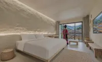 Chunxiao Mid-Levels Cave Panorama Hotel Hotels near China Xijiang Qianhu Miao Village - Hundred-year Stilted Buildings