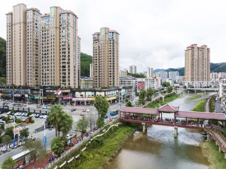 Datian Baoshan Business Hotel Отели в г. Датянь