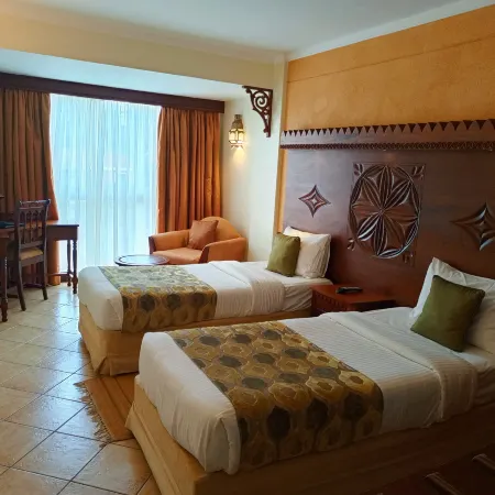 The Heron by Sarovar Portico India Отели рядом с достопримечательностью «Центральный парк»