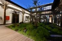 Banyinli Courtyard Hotel (Yingshang Chunqiu Guan Zhong Culture Store) - موقف سيارات