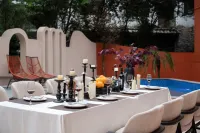 qianhuan.redhouseshejishidujiabieshu(xiaoqikongdongmenshoupiaodatingdian) Hotels in 