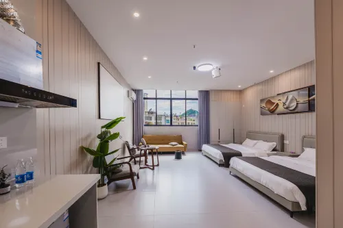 Xingyi Yixing Guesthouse‑Wanfenglin Airport & High‑Speed Railway South Station Branch - สัตว์เลี้ยง