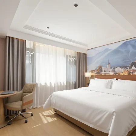 Vienna Hotel (Luquan Zhangjiu River Park Branch)