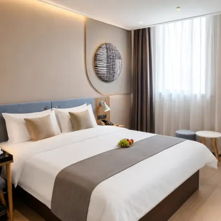 Yijia Hotel (Xinyi Railway Station Nanjing Road)