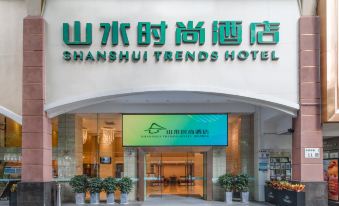 The front entrance of a restaurant is depicted, featuring a sign above it and an illuminated doorway at Shanshui Trends Hotel (Shenzhen Huaqiangbei)