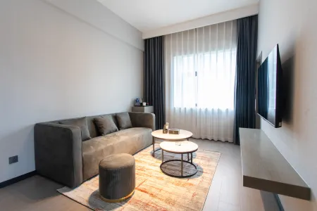 Jin Bo Apartment Отели в г. Цюйцзин