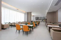 Vienna International Hotel (Haikou Xinbu Island Branch) - بار