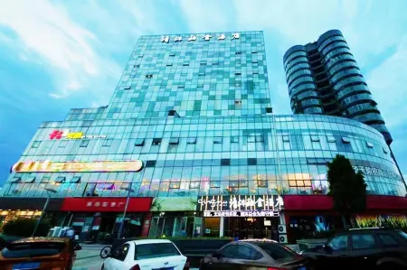 Qingmu Platinum Hotel (Guanghan Bailun Square Tianjie Branch) Отели в г. Гуанхан