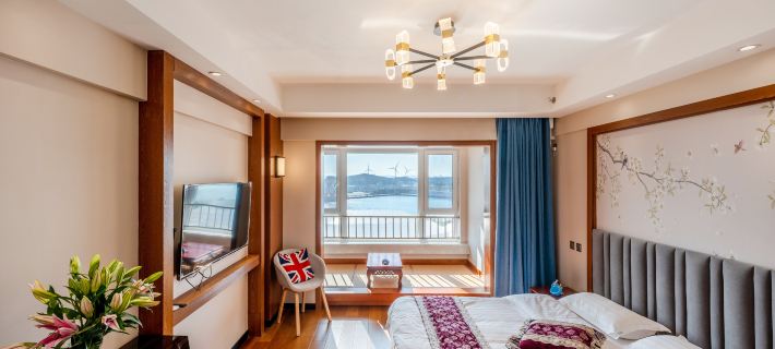 Xingwan Shibei Scenic Apartment (Development Zone Shibei Bay Fantasy Water Park) Hotel di Dalian