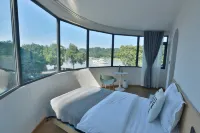 Leshan Futai Homestay (Zhanggong Bridge)