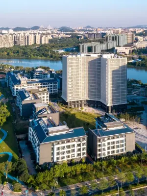 Guangzhou Bio island International Apartment Отели рядом с достопримечательностью «Деревня Дай Цунь»