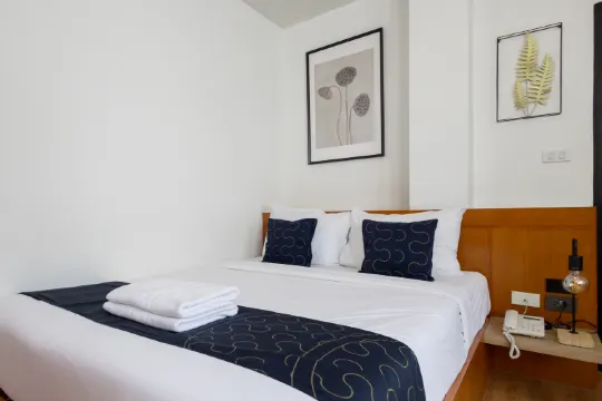 ห้องดีลักซ์ เตียงใหญ่ 1 เตียง