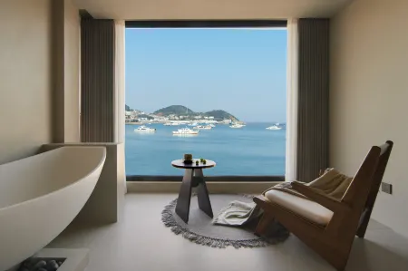 Sanheli Villa Seaview Designer Meizhu (Zhoushan Zhujiajianwushitang Store) Отели рядом с достопримечательностью «zhang zhou wan»