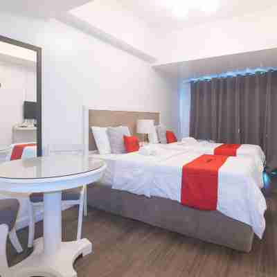 RedDoorz @ MPT Suites Rooms