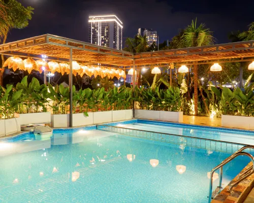 Sujet Beach Hotel and Apartment Danang by Haviland Hôtels à proximité de : Pont du Dragon