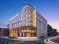Echarm Hotel Huludao Railway Station Hôtels à : Huludao