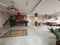 Yuguo Business Hotel - parkir