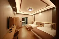 Deqin Xincheng Yujv Homestay - Inns