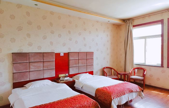 Xingyuan Business Hotel (Lingwu Yindong International Auto Parts City)