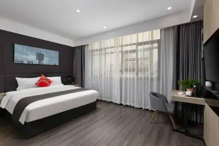 Shankee Coffee Style Hotel (Shangrao Yugan Tianhong Shopping Center) Отели рядом с достопримечательностью «Lake Biwa Scenic Area»