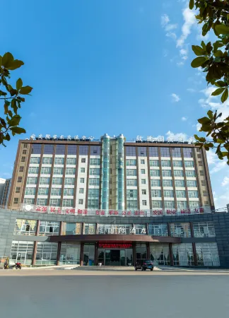 Zhiyuan International Hotel Отели рядом с достопримечательностью «Yunnan Minzu University (Yuhua Campus)»
