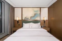 Heyue Business Hotel (ENJOY.LAND) - Flughafentransfer