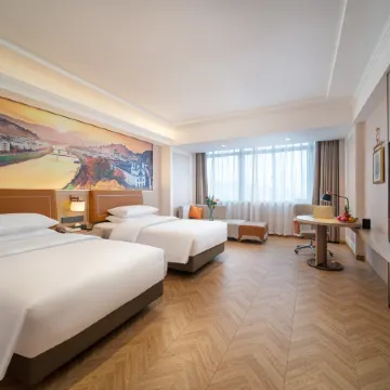 Vienna Hotel (Shenzhen Longgang Longdong) Отели рядом с достопримечательностью «Biadi Share Co. ООО.»