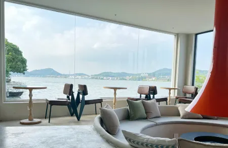 Jiujian Tang Yiya Artcafe Homestay Отели рядом с достопримечательностью «Dongqian Lake Xiaoputuo»