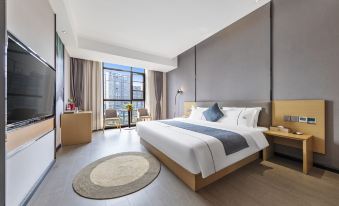 Ziyueqi Light Luxury Hotel (Meishan East Station Wanda Plaza)