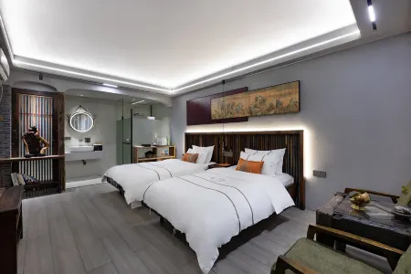 Xitang YiZhao Yixi Huayuan Resort Hotel Отели рядом с достопримечательностью «Yongning Bridge»