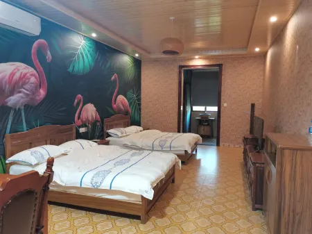 Jinghong Duoli Inn Отели рядом с достопримечательностью «Menghanman Tingfota Temple»